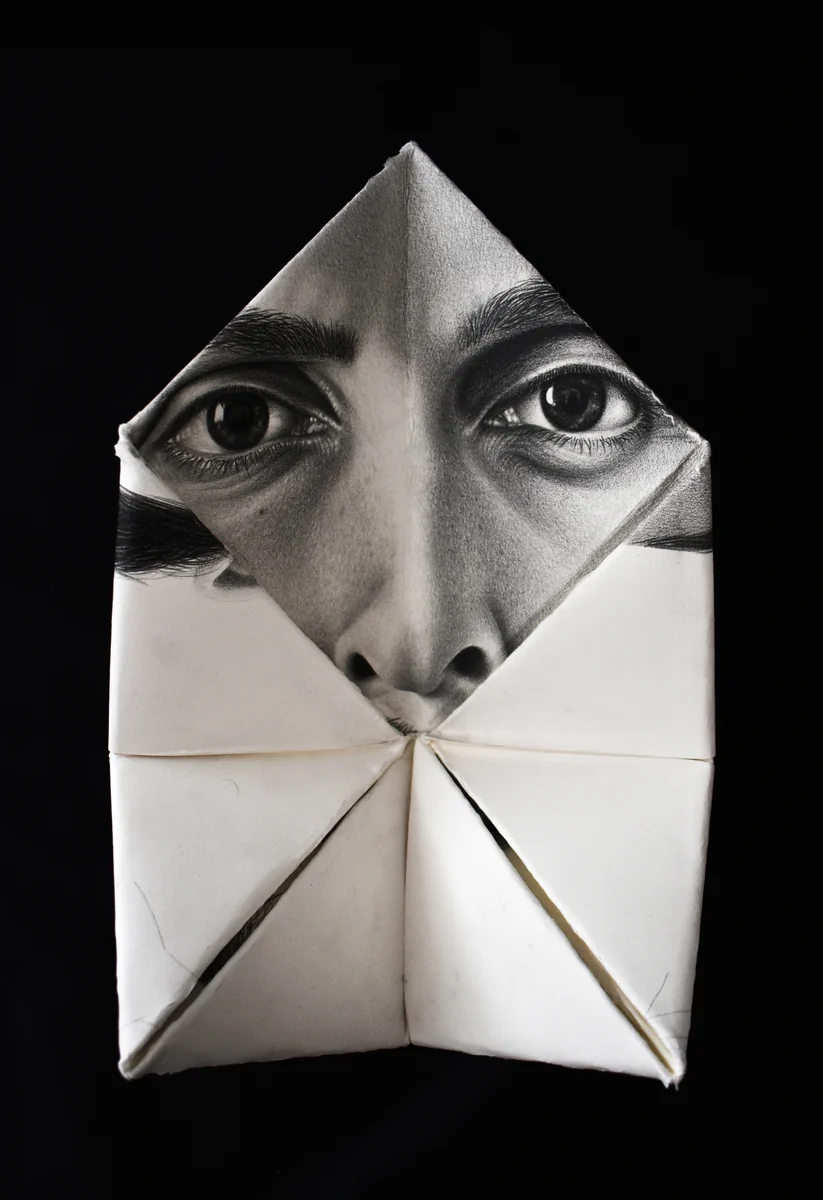 ORIGA-ME, folded white paper sculptural portrait with a single visible eye